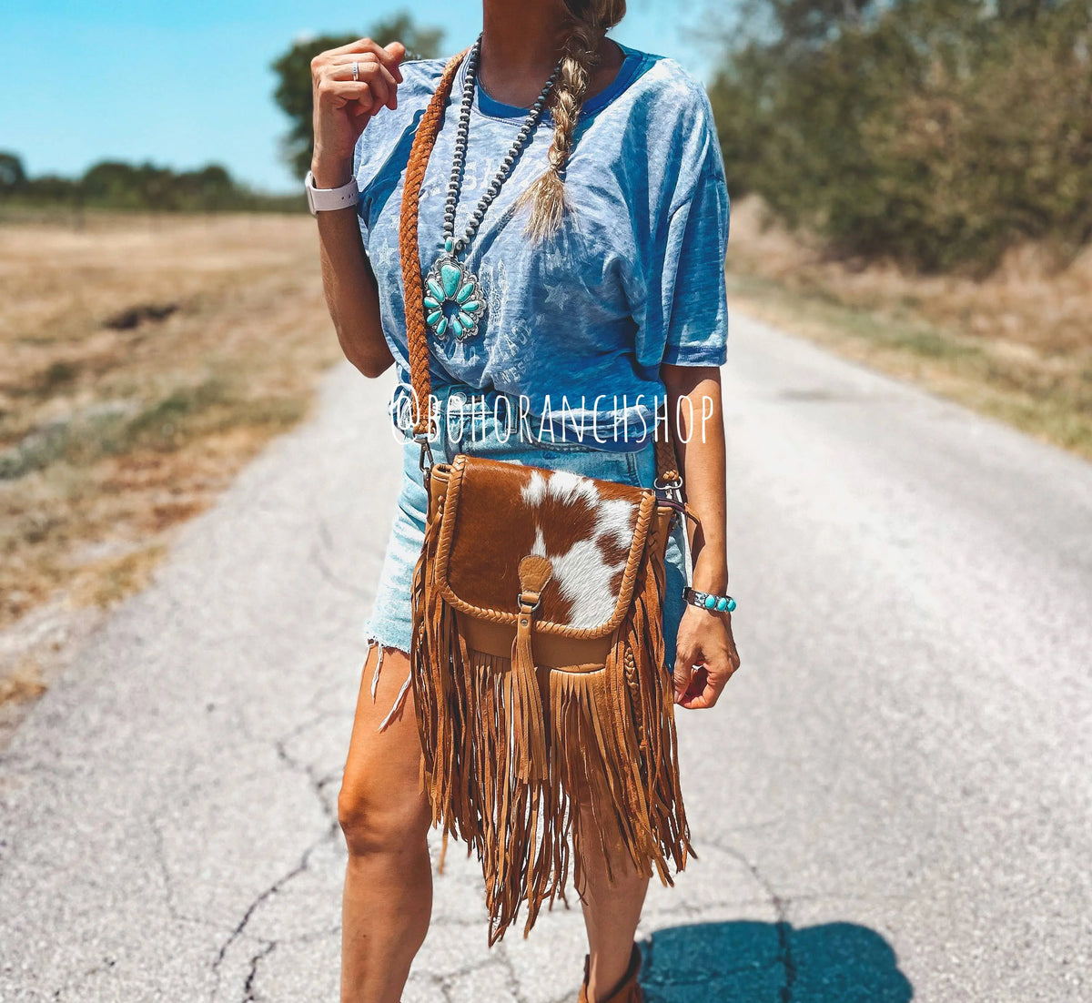 THE ANTONIO COWHIDE LEATHER TASSEL CROSSBODY