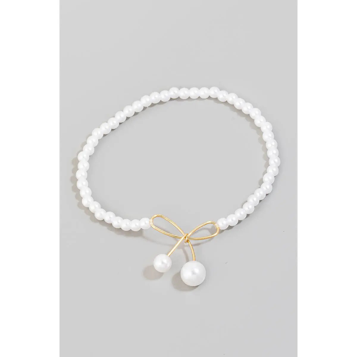 BEADED PEARL BOW BRACELET